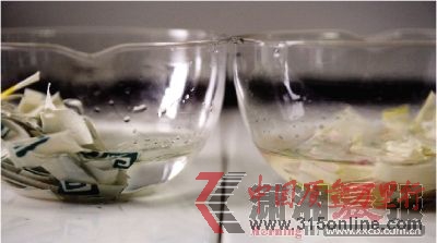 紙杯經(jīng)過30分鐘的乙醇浸泡后,左邊碗液體成無色狀,右邊碗液體偏紅色。本組圖/記者陳勇 紙杯經(jīng)過30分鐘的乙醇浸泡后,左邊碗液體成無色狀,右邊碗液體偏紅色。本組圖/記者陳勇