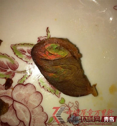 變成紅藍顏色的豬頭肉(資料圖片) 變成紅藍顏色的豬頭肉(資料圖片)
